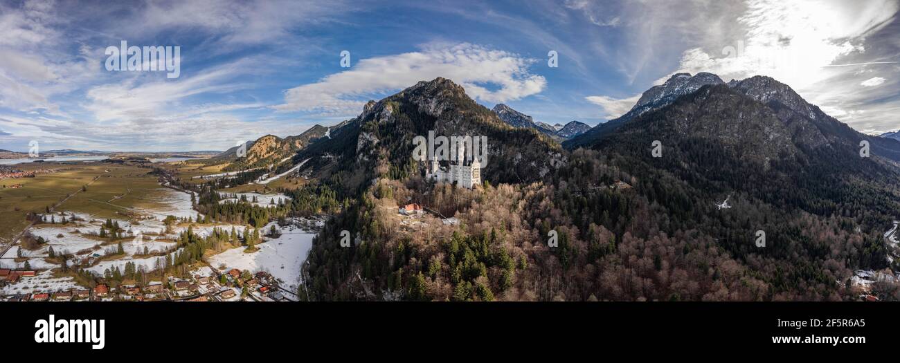 Aerial panorama drone shot of Hohenschwangau in Fussen with view of Neuschwanstein castle in Germany winter Stock Photo