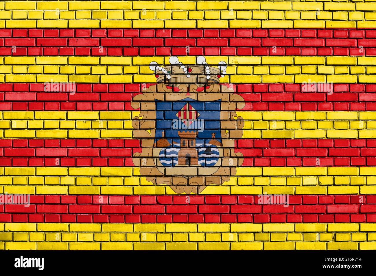 flag of Benidorm painted on brick wall Stock Photo
