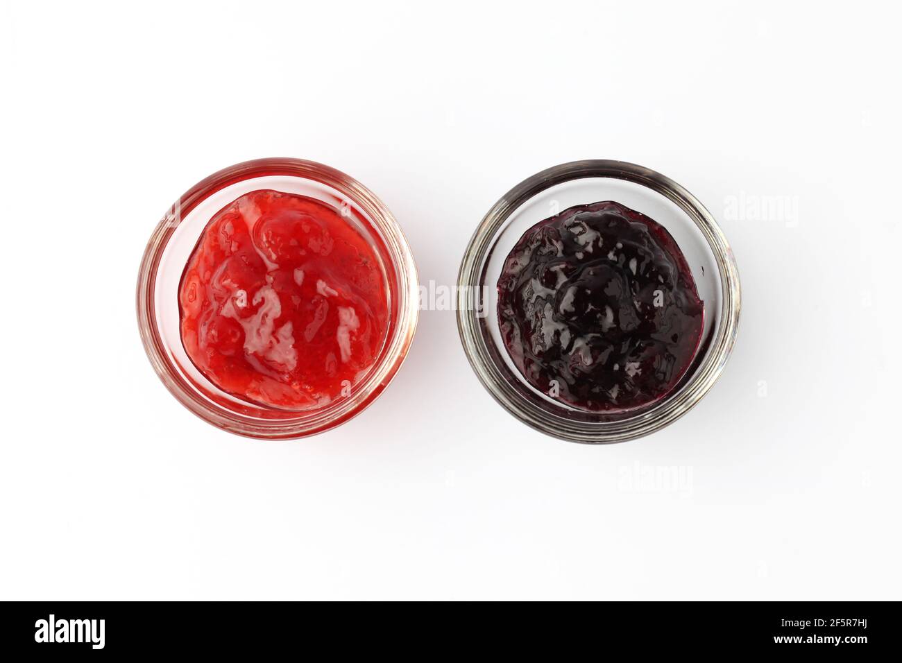 strawberry jam blueberry jam marmalade on white background Stock Photo