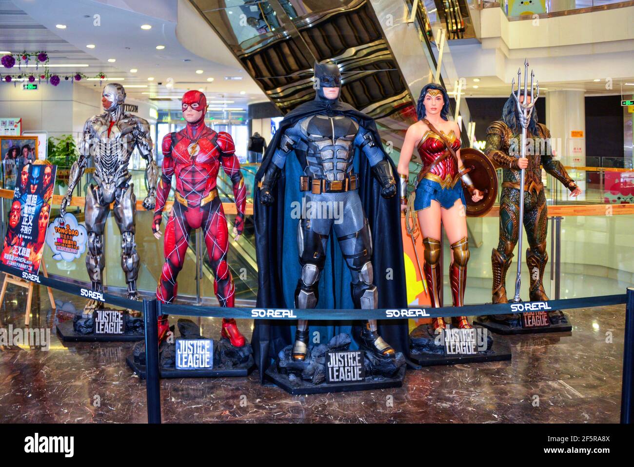 Beijing, China - November 10, 2017:  Statues of characters, Cyborg, The Flash, Batman, Wonder Woman and Acquaman in Justice League movie on display in Stock Photo