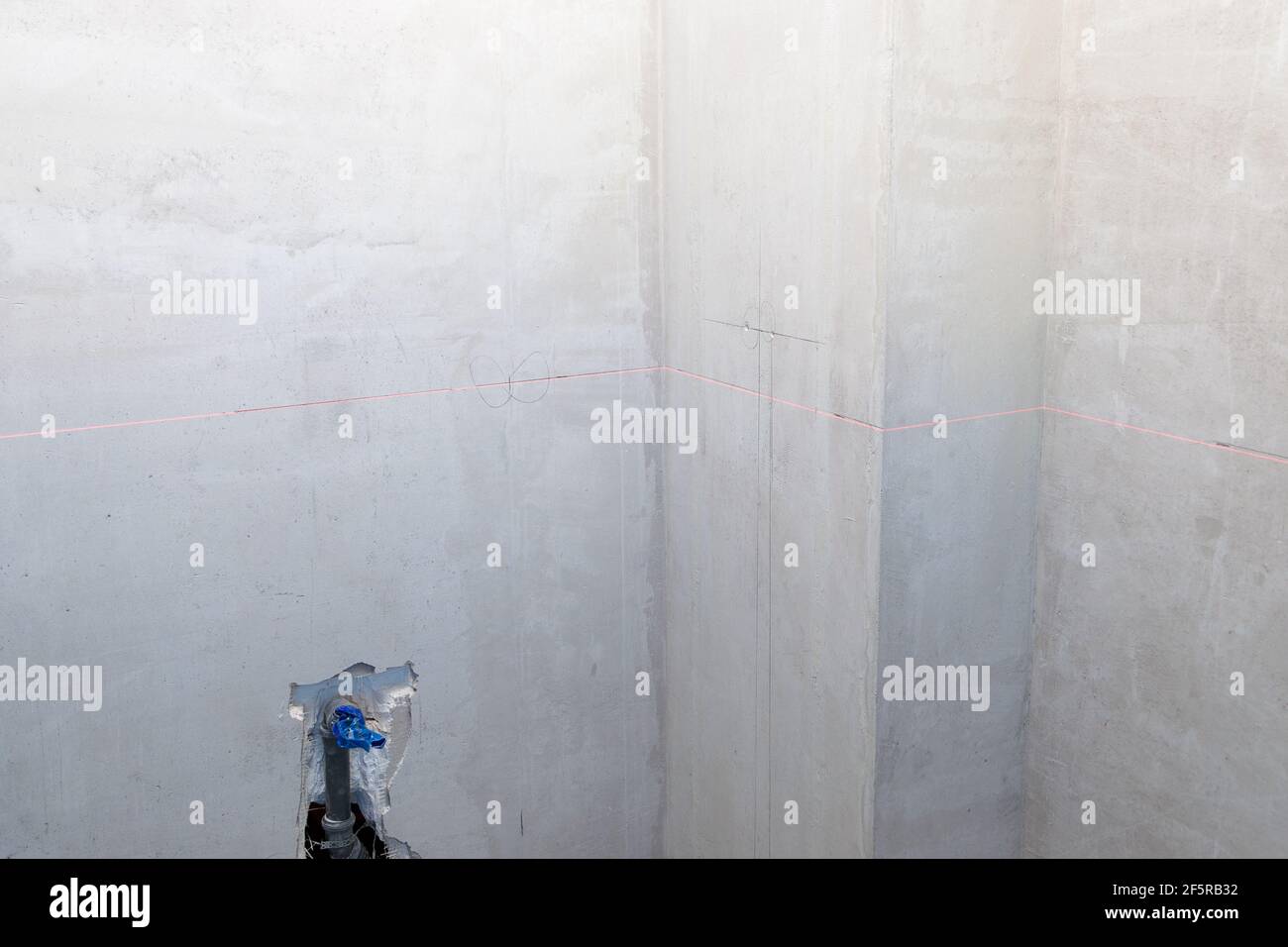 Laser marking of the level on the wall, construction, interior