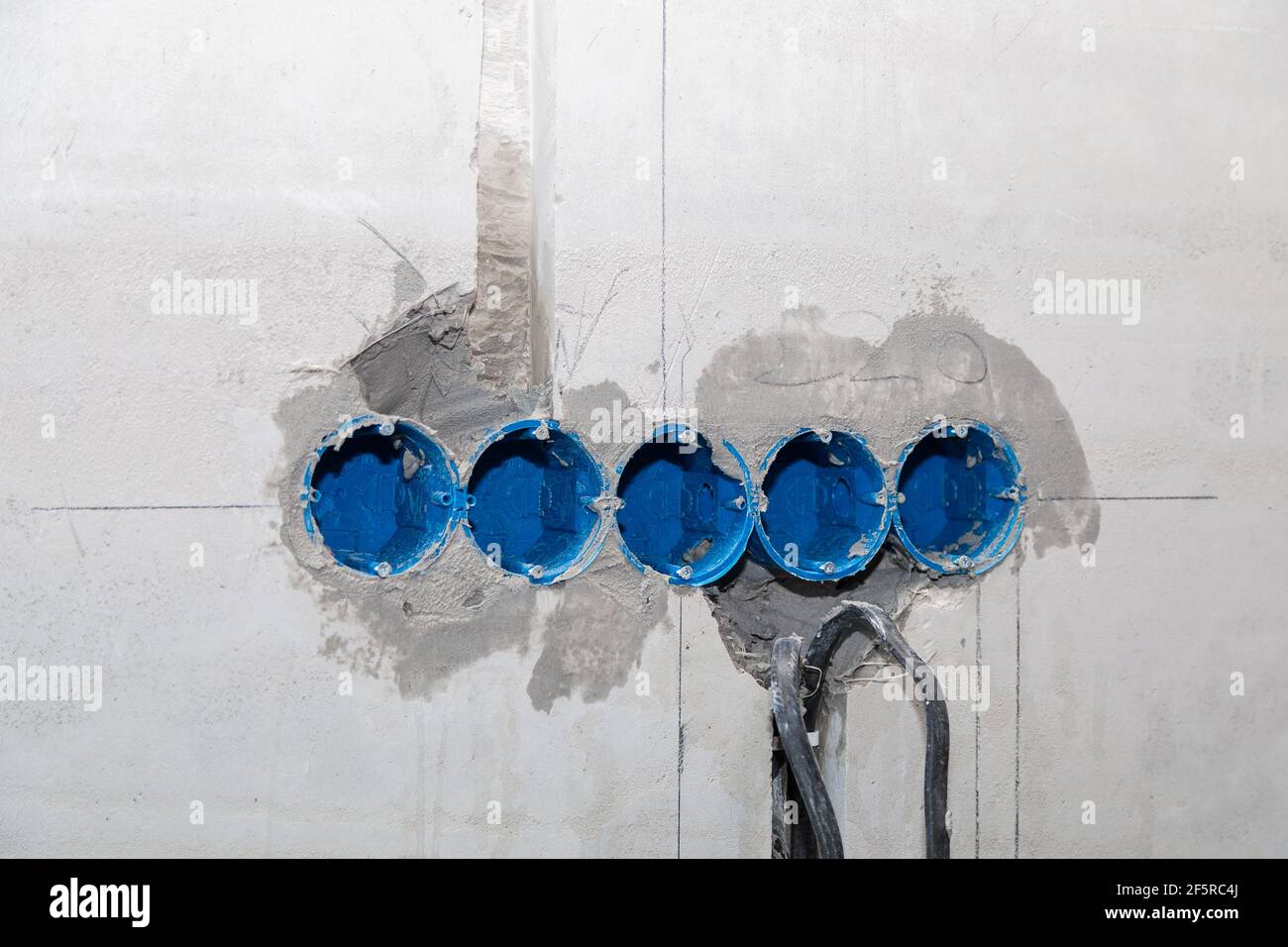 The electrician will plaster holes and channels for sockets and wires