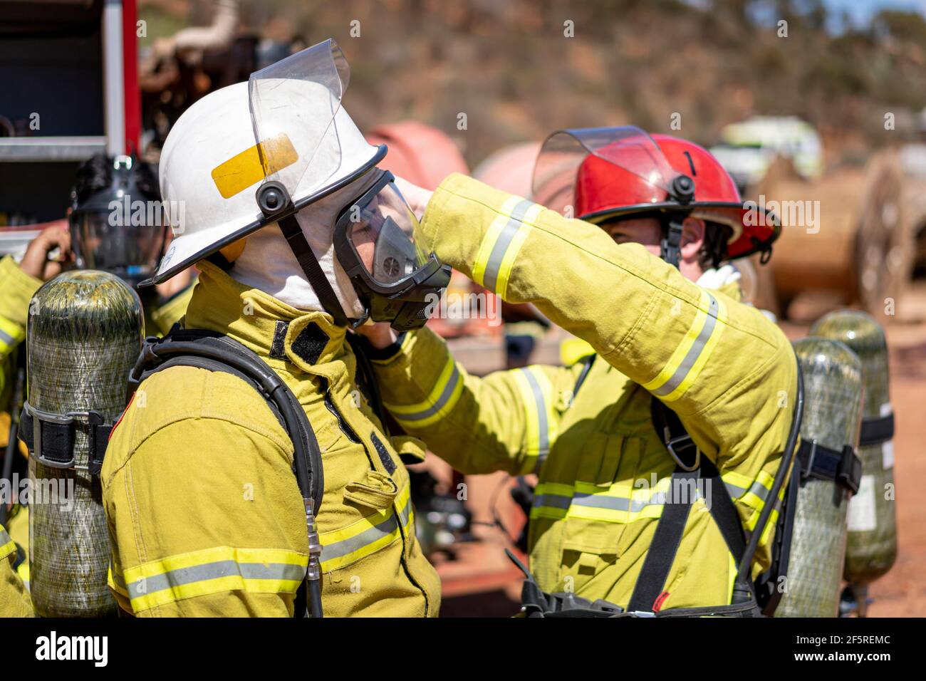 Mine Emergency Response Team preparing breathing apparatus to undertake firefighting and