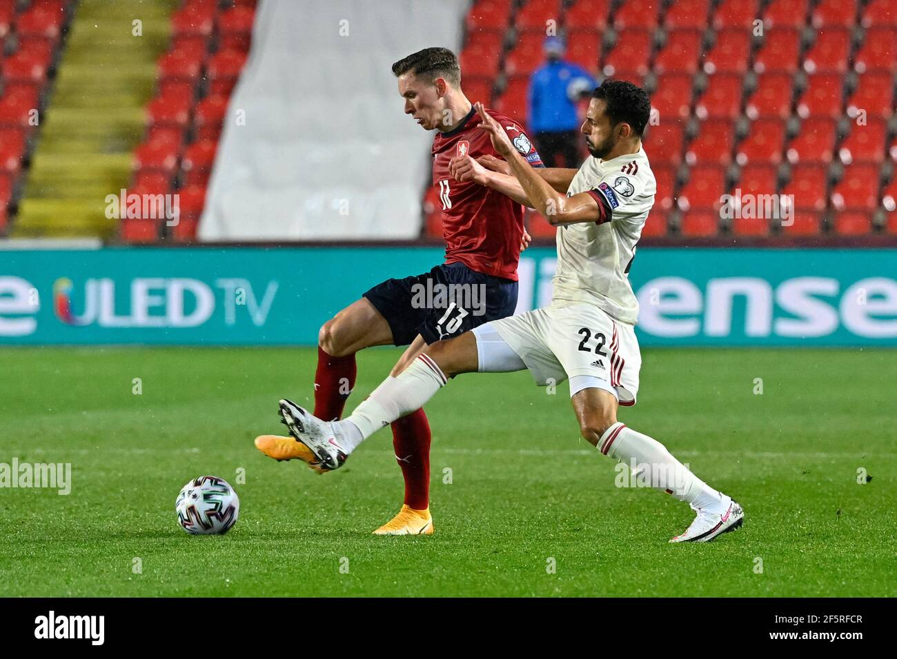 Prague, Czech Republic. 27th Mar, 2021. L-R Lukas Provod of Czech and Nacer Chadli of Belgium in action during the World Cup qualifier group E: Czechia vs Belgium in Prague, Czech Republic, on Saturday, March 27, 2021. Credit: Vit Simanek/CTK Photo/Alamy Live News Stock Photo