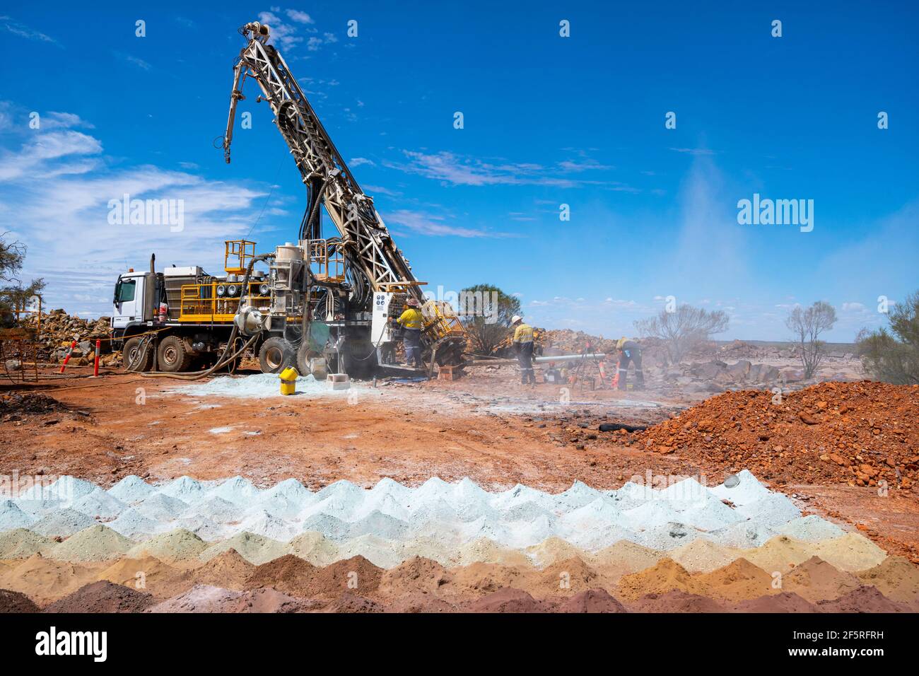 Drill Rigg exploring for minerals in arid landscape. Western Australia Stock Photo