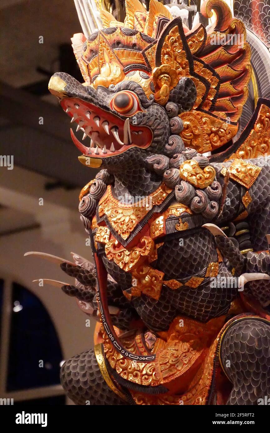 AMSTERDAM, NETHERLANDS - DEC 12, 2018 - Large wooden dragon sculpture from Indonesia, Tropen Museum, Amsterdam, Netherlands Stock Photo
