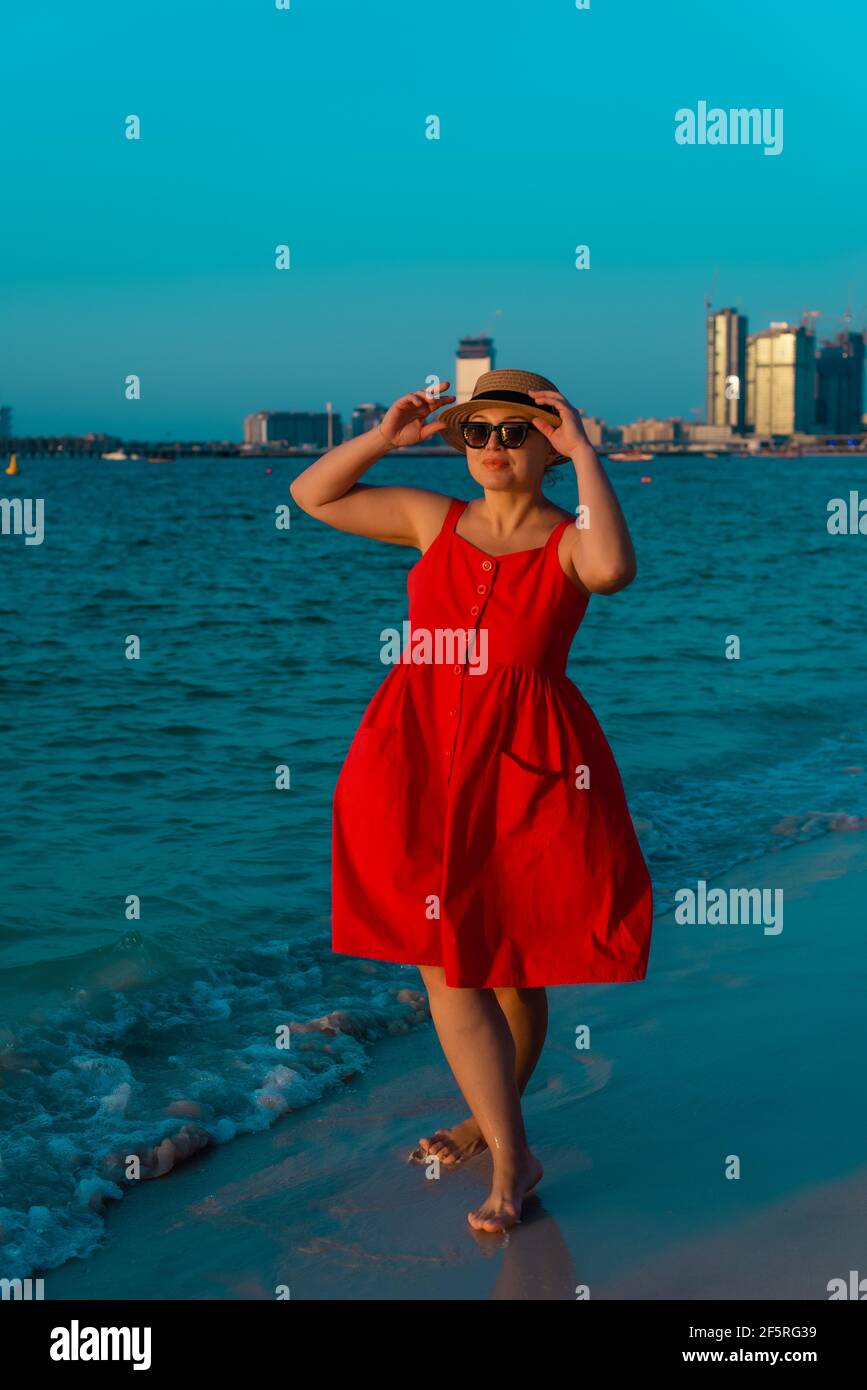 Dubai beach woman hires stock photography and images Alamy