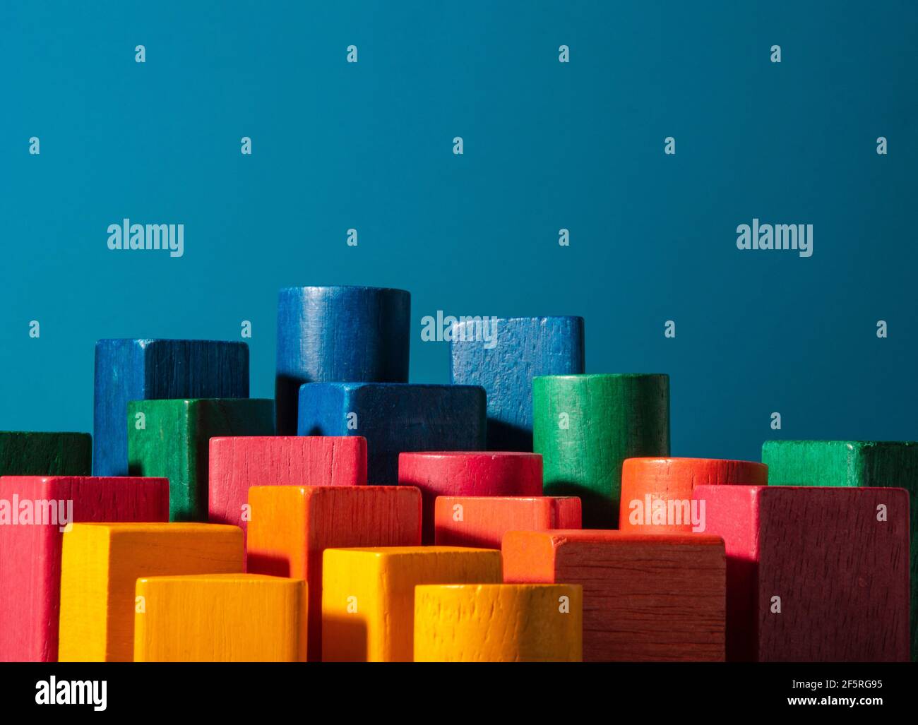 Toy of colored wood blocks. Skyscraper metaphor Stock Photo