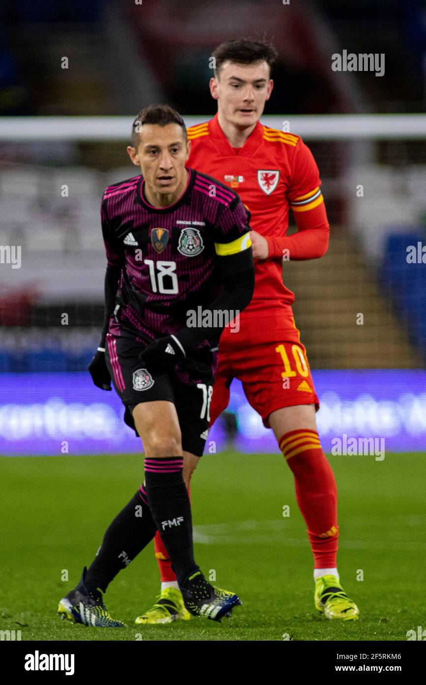 Cardiff, UK. 27th Mar, 2021. Andrés Guardado of Mexico (L) in action against Dylan Levitt of Wales (R) Football international friendly match, Wales v Mexico, at the Cardiff city stadium in Cardiff, South Wales on Saturday 27th March 2021. Editorial use only. pic by Lewis Mitchell/Andrew Orchard sports photography/Alamy Live News Credit: Andrew Orchard sports photography/Alamy Live News Stock Photo