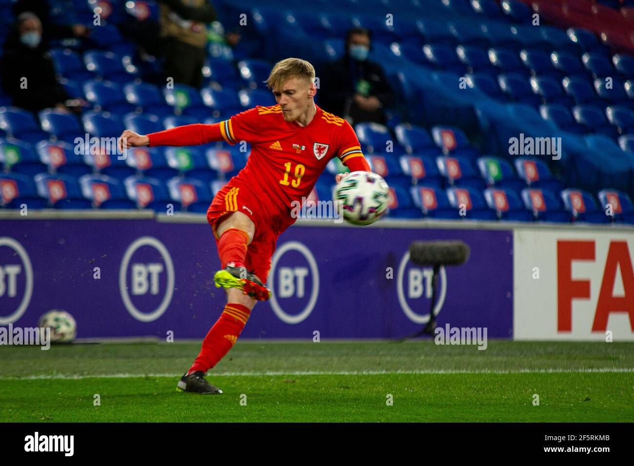 Cardiff, UK. 27th Mar, 2021. Matthew Smith of Wales crosses the ball Football international friendly match, Wales v Mexico, at the Cardiff city stadium in Cardiff, South Wales on Saturday 27th March 2021. Editorial use only. pic by Lewis Mitchell/Andrew Orchard sports photography/Alamy Live News Credit: Andrew Orchard sports photography/Alamy Live News Stock Photo