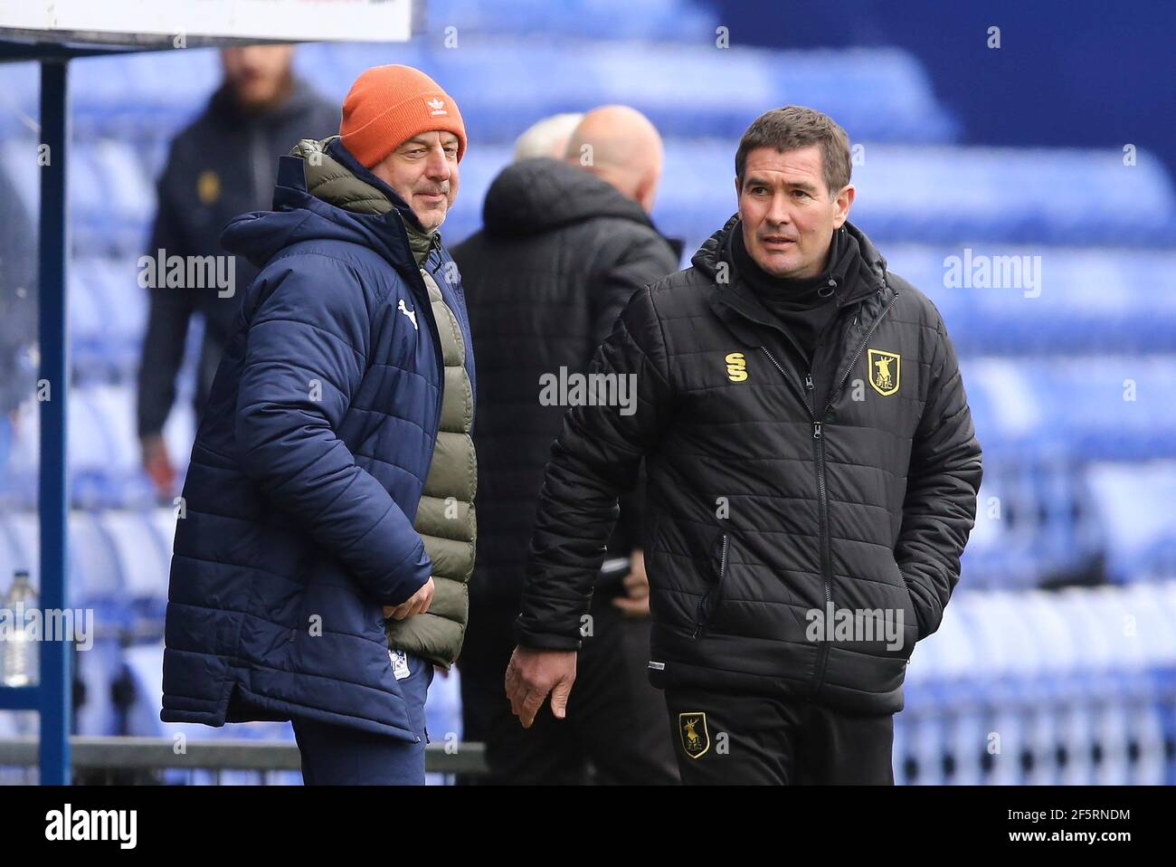 Birkenhead, UK. 27th Mar, 2021. Tranmere Rovers Manager Keith Hill (l) and Mansfield Town Manager Nigel Clough look on. EFL Skybet Football league two match, Tranmere Rovers v Mansfield Town at Prenton Park, Birkenhead, Wirral on Saturday 27th March 2021. this image may only be used for Editorial purposes. Editorial use only, license required for commercial use. No use in betting, games or a single club/league/player publications.pic by Chris Stading/Andrew Orchard sports photography/Alamy Live News Credit: Andrew Orchard sports photography/Alamy Live News Stock Photo