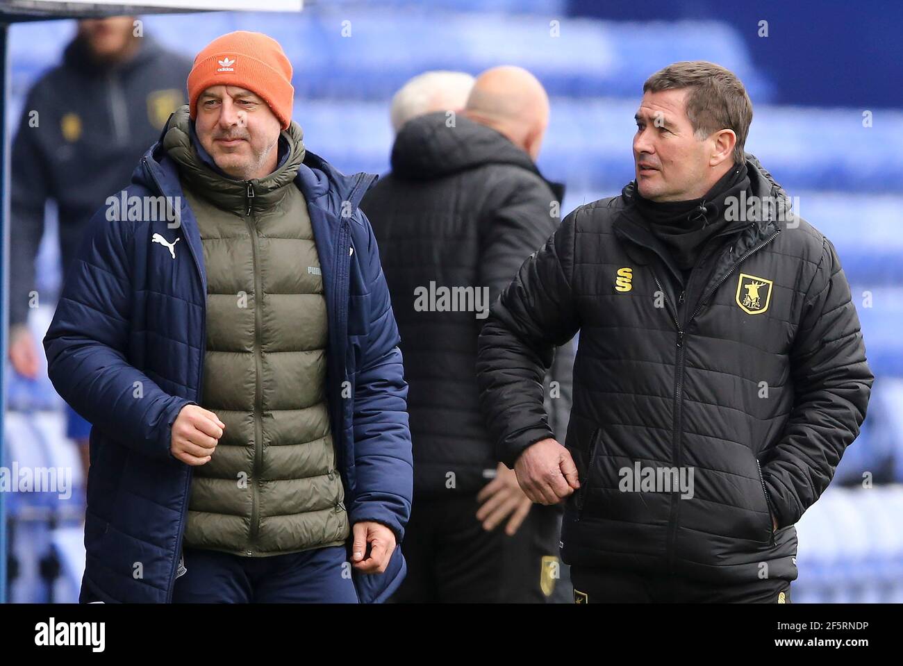 Birkenhead, UK. 27th Mar, 2021. Tranmere Rovers Manager Keith Hill (l) and Mansfield Town Manager Nigel Clough look on. EFL Skybet Football league two match, Tranmere Rovers v Mansfield Town at Prenton Park, Birkenhead, Wirral on Saturday 27th March 2021. this image may only be used for Editorial purposes. Editorial use only, license required for commercial use. No use in betting, games or a single club/league/player publications.pic by Chris Stading/Andrew Orchard sports photography/Alamy Live News Credit: Andrew Orchard sports photography/Alamy Live News Stock Photo
