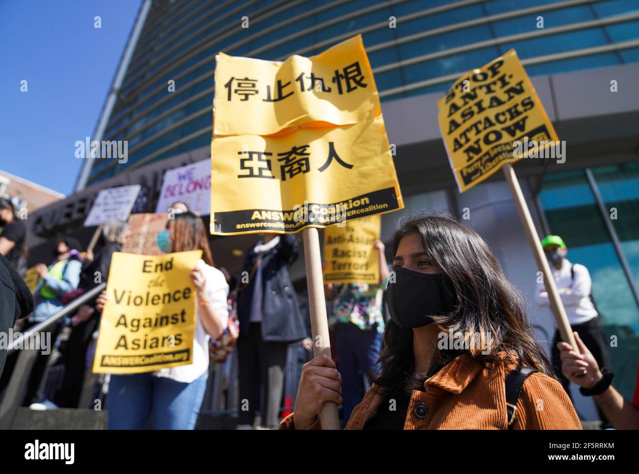 New York, USA. 27th Mar, 2021. People attend a rally against racism and violence on Asian Americans in Flushing of New York, the United States, March 27, 2021. Credit: Wang Ying/Xinhua/Alamy Live News Stock Photo