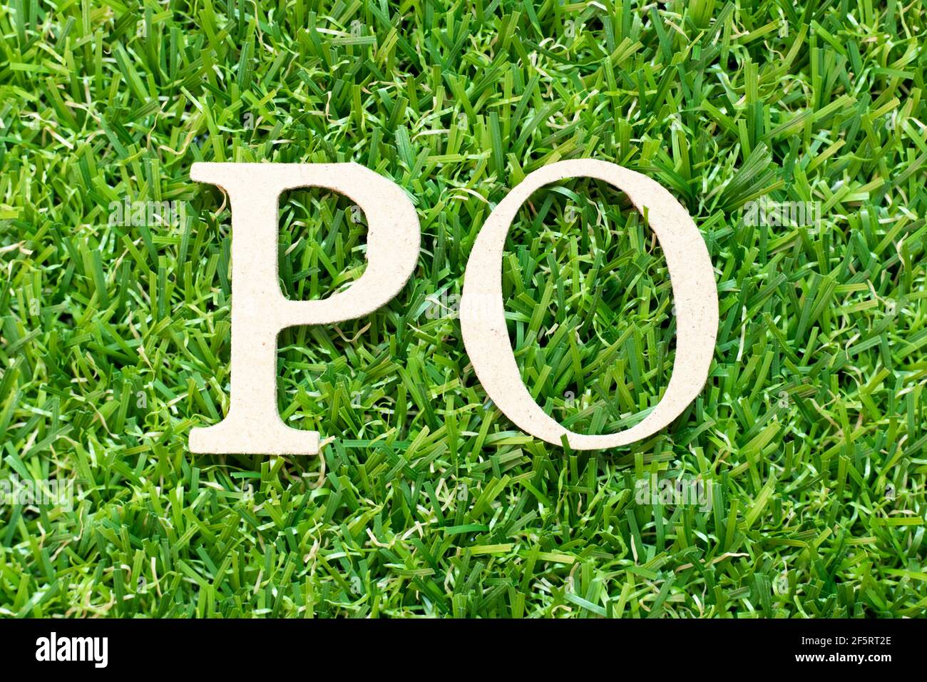 Alphabet letter in word PO (Abbreviation of purchase order) on green