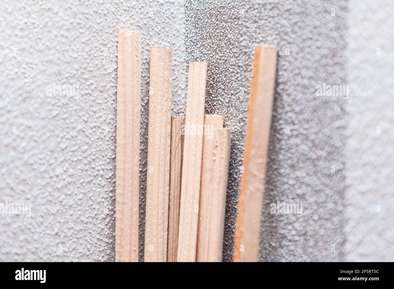 Wooden glazing beads . Finishing timber product for window Stock Photo