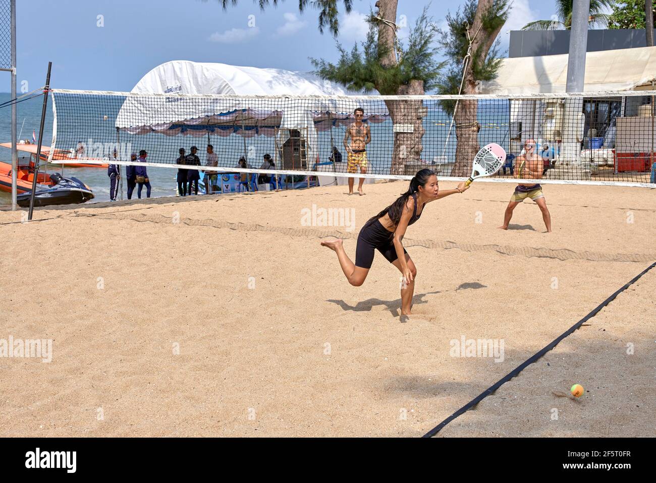 Beach tennis with woman competitor Stock Photo