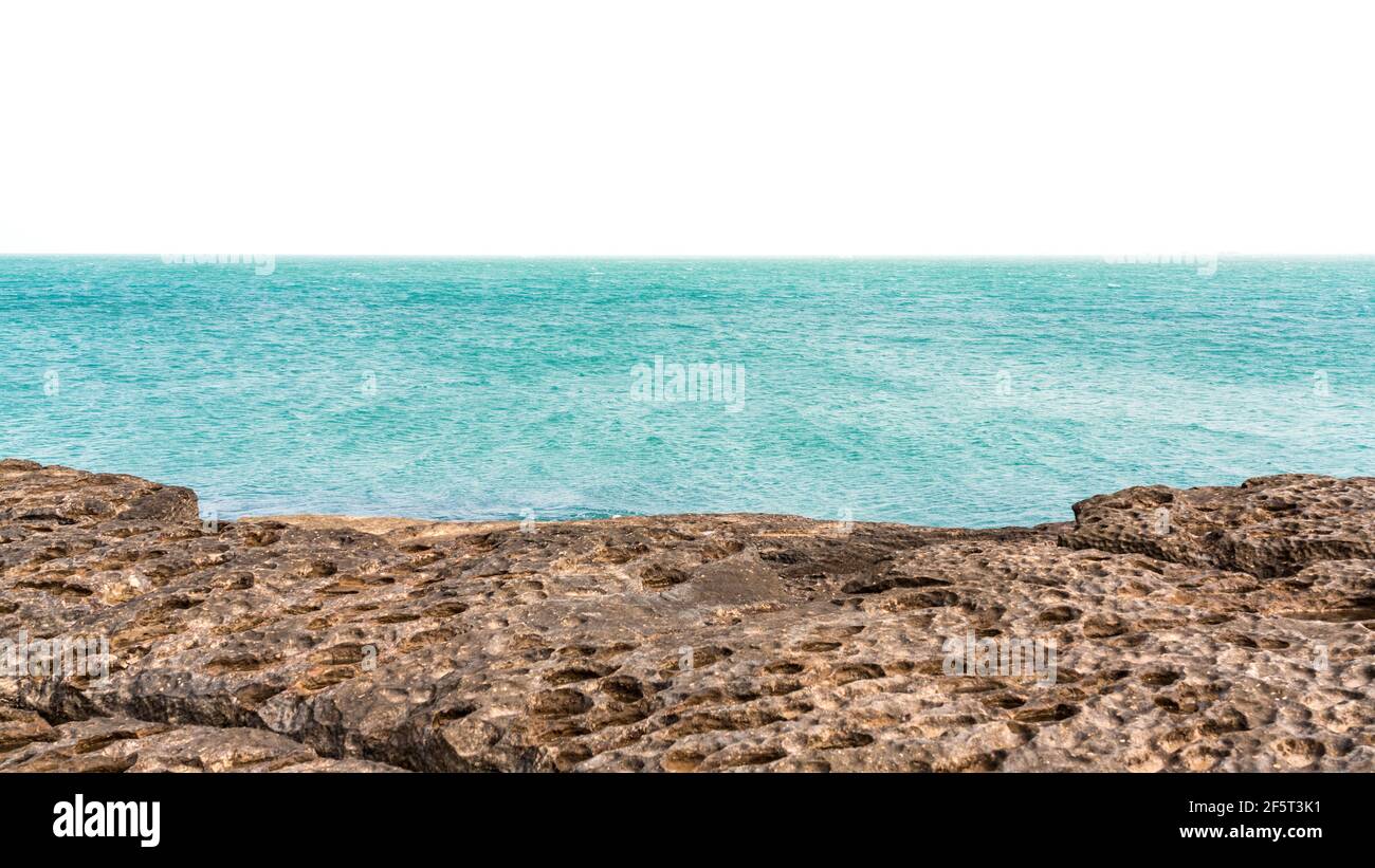 Clear sea water splashing rocky hi-res stock photography and images - Alamy