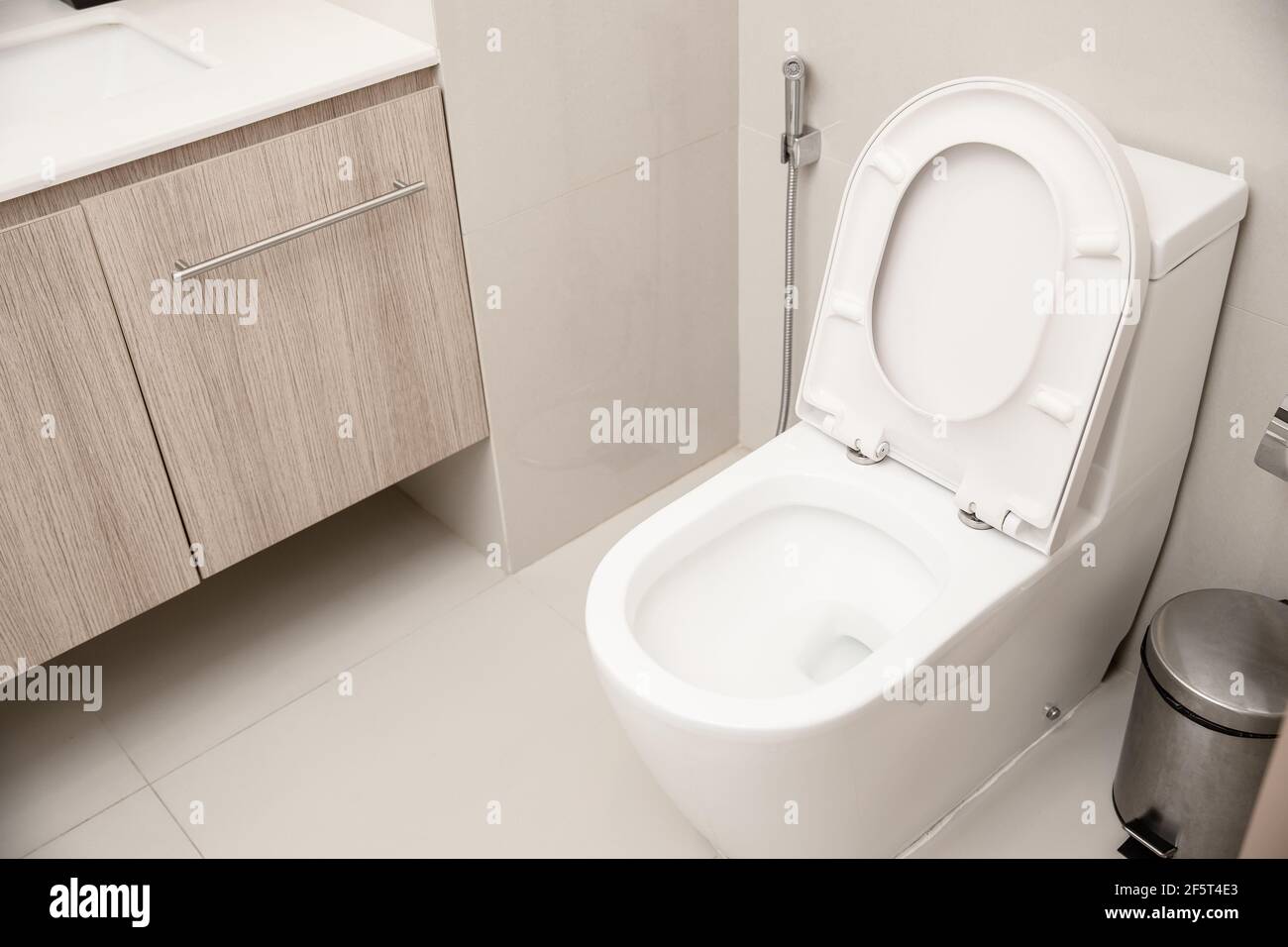 Clean Toilet bowl in hotel bathroom interior decoration Stock Photo