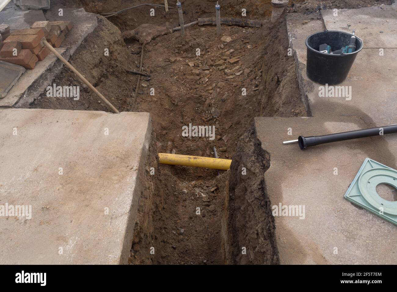 Supply lines in the ditch for the energy supply of a multiple dwelling Stock Photo