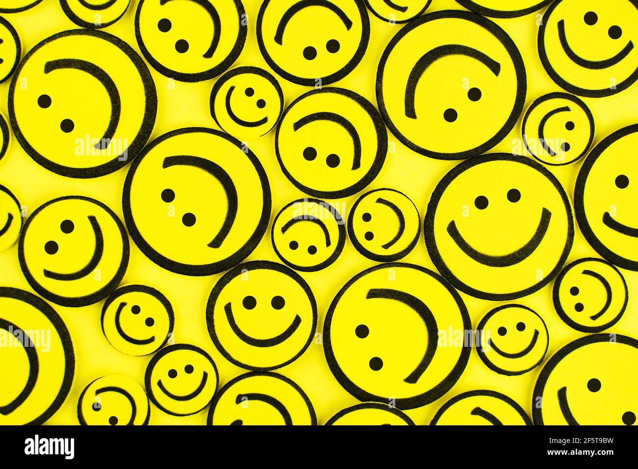 Yellow positive emoticons background. Smile and joy concept. Good morning. Have a nice day! Stock Photo