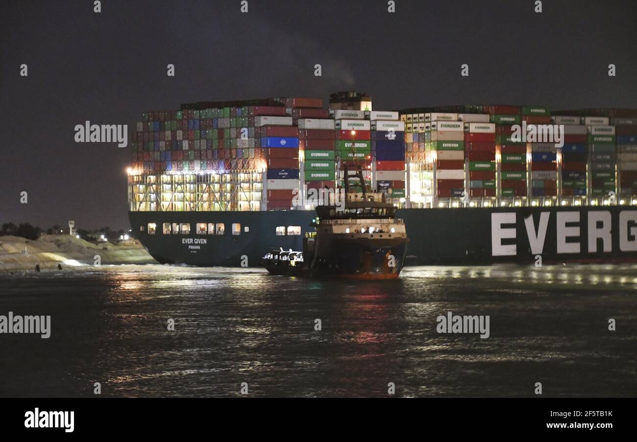 The stranded container ship Ever Given (back) is pictured in Egypt's