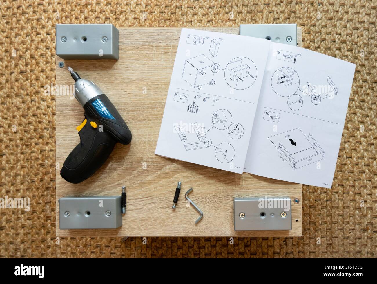 DIY self assembly furniture with tools and instruction booklet Stock