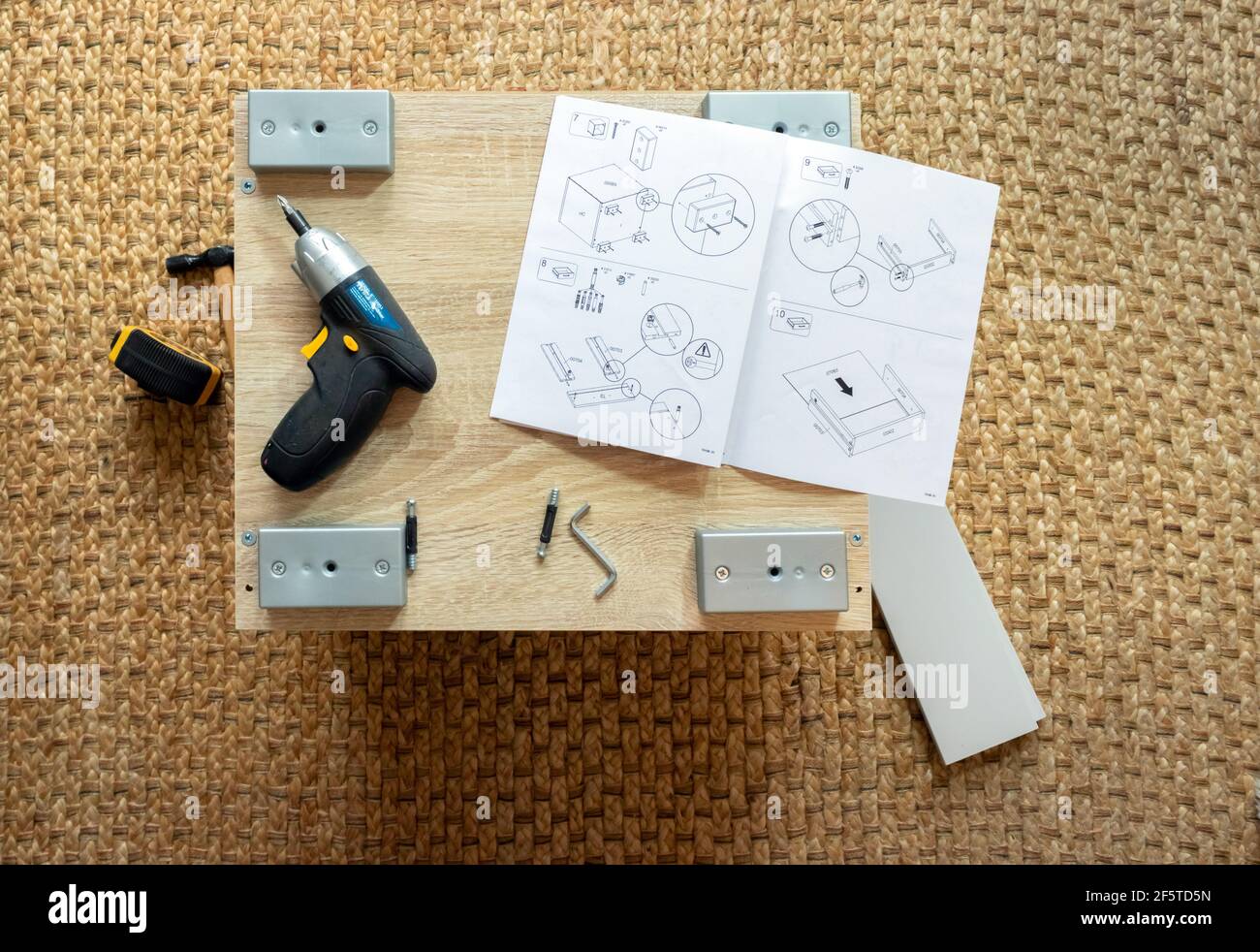 DIY self assembly furniture with tools and instruction booklet Stock