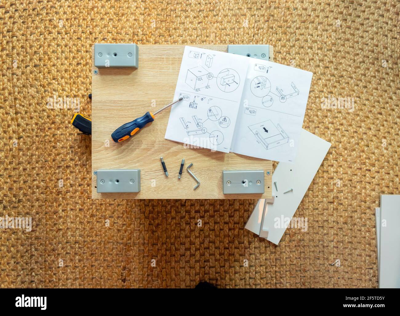 DIY self assembly furniture with tools and instruction booklet Stock
