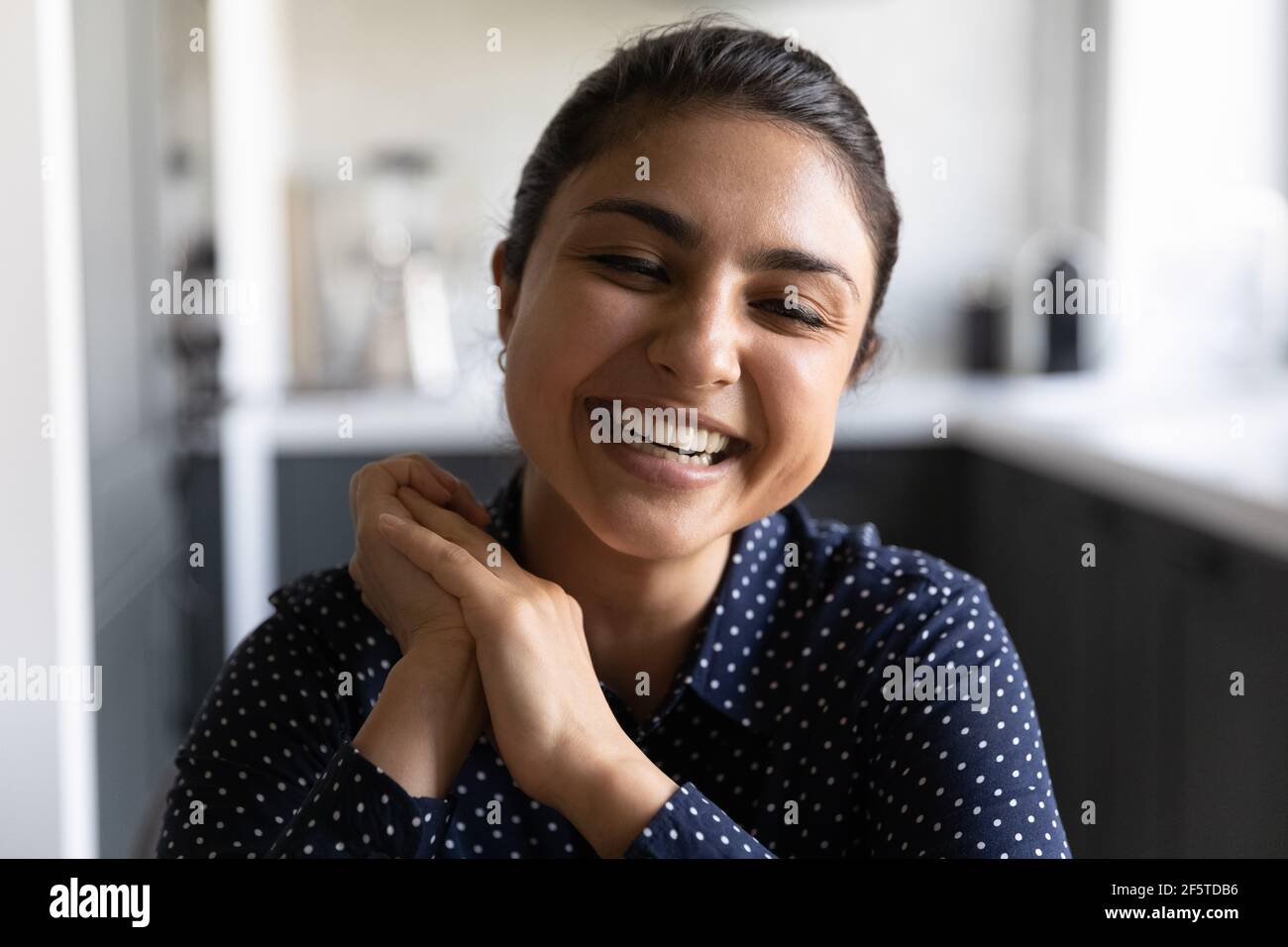 Head shot portrait smiling Indian woman making video call Stock Photo ...