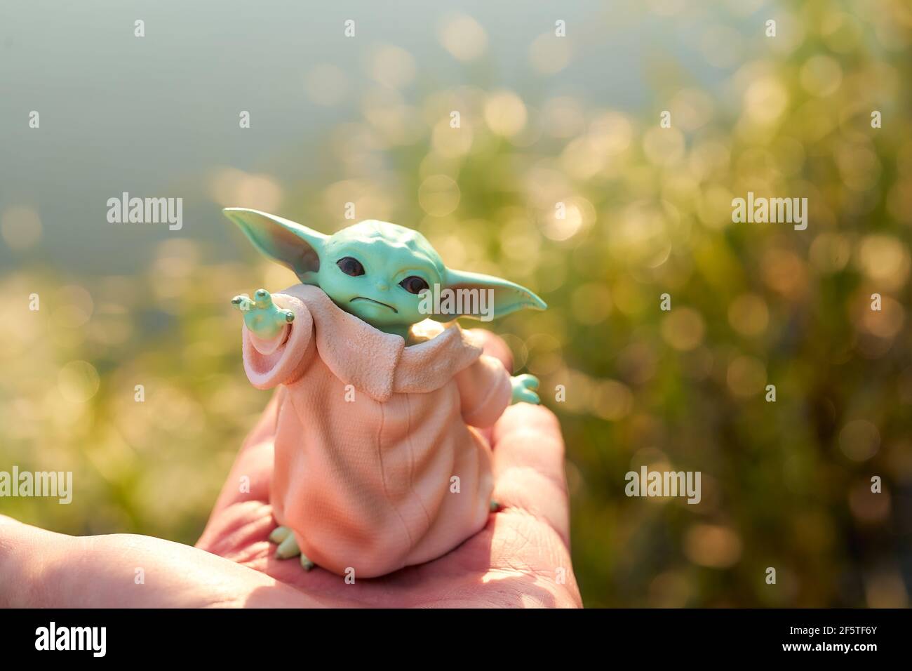 October Display Of Baby Yoda An Action Figures Standing On Hand Bokeh Effect Stock Photo Alamy October Display Of Baby Yoda An Action Figures Standing On Hand Bokeh Effect Stock Photo Alamy