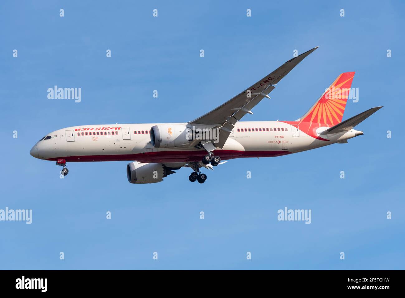 Air India Boeing 787 Dreamliner jet airliner plane VT-ANC on finals to land at London Heathrow Airport, UK, in blue sky. Indian airline, flag carrier Stock Photo