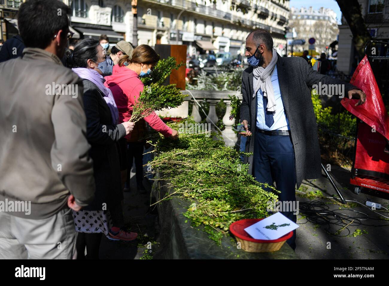 Paris, France. 28th Mar, 2021. Palm Sunday celebration at the Church of Saint-Nicolas-du-Chardonnet in Paris, France, on March 28, 2021. Palm Sunday symbolizes the entry into Holy Week for Catholics. A moment of great fervor, which will once again have to adapt to the health context. Photo by Lionel Urman/ABACAPRESS.COM Credit: Abaca Press/Alamy Live News Stock Photo