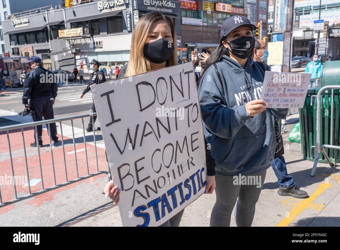 New York, United States. 27th Mar, 2021. Women hold placards during the National Day of Action rally at the Flushing neighbourhood.Rallies and a show of support for Asian Americans sprang up Saturday across country as members and supporters of the Asian-American community take part in a National Day of Action. Credit: SOPA Images Limited/Alamy Live News Stock Photo