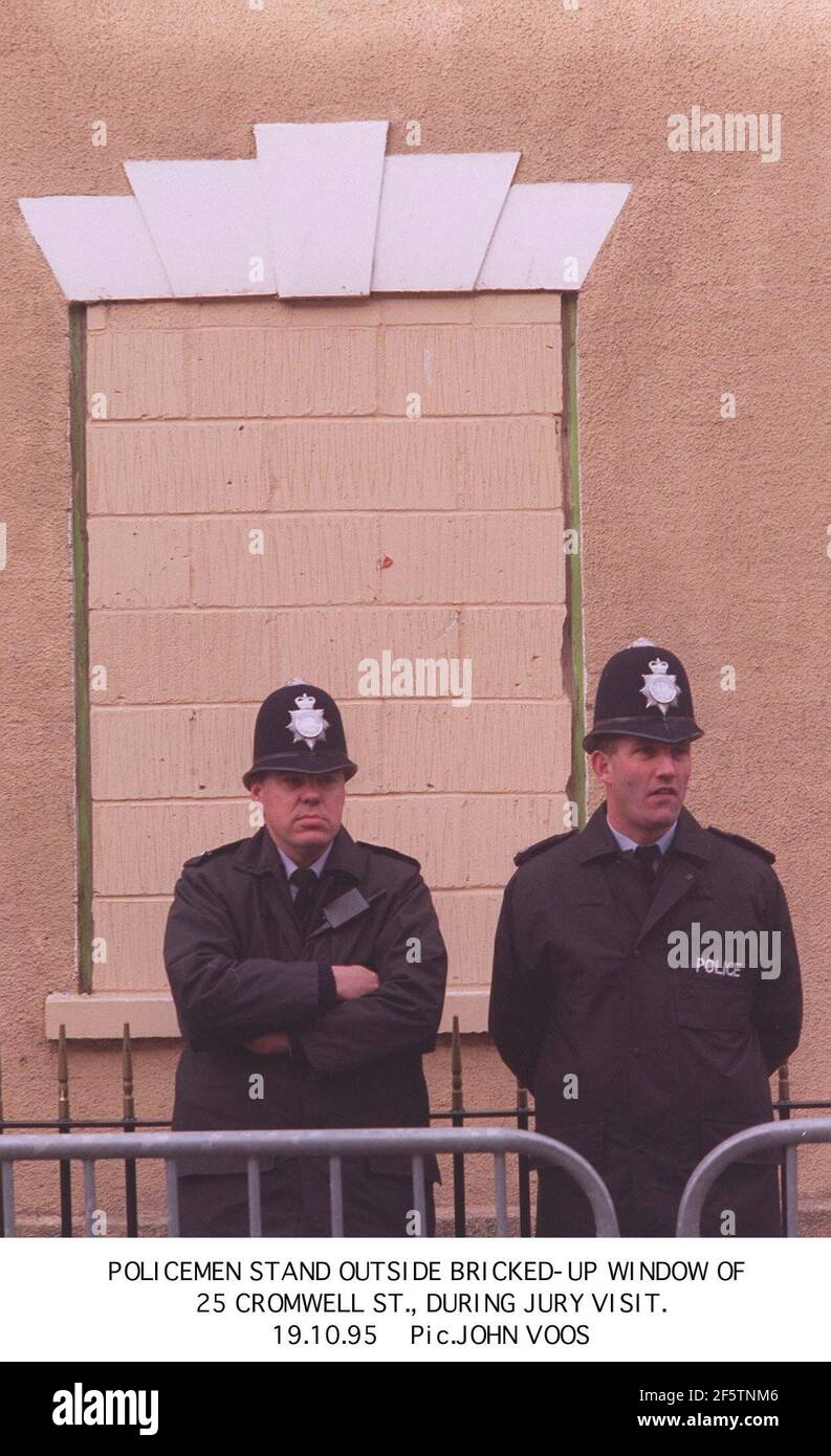 Policeman stood outside the house of Fred and Rosemary West at 25 Cromwell Street during visit of jury Stock Photo