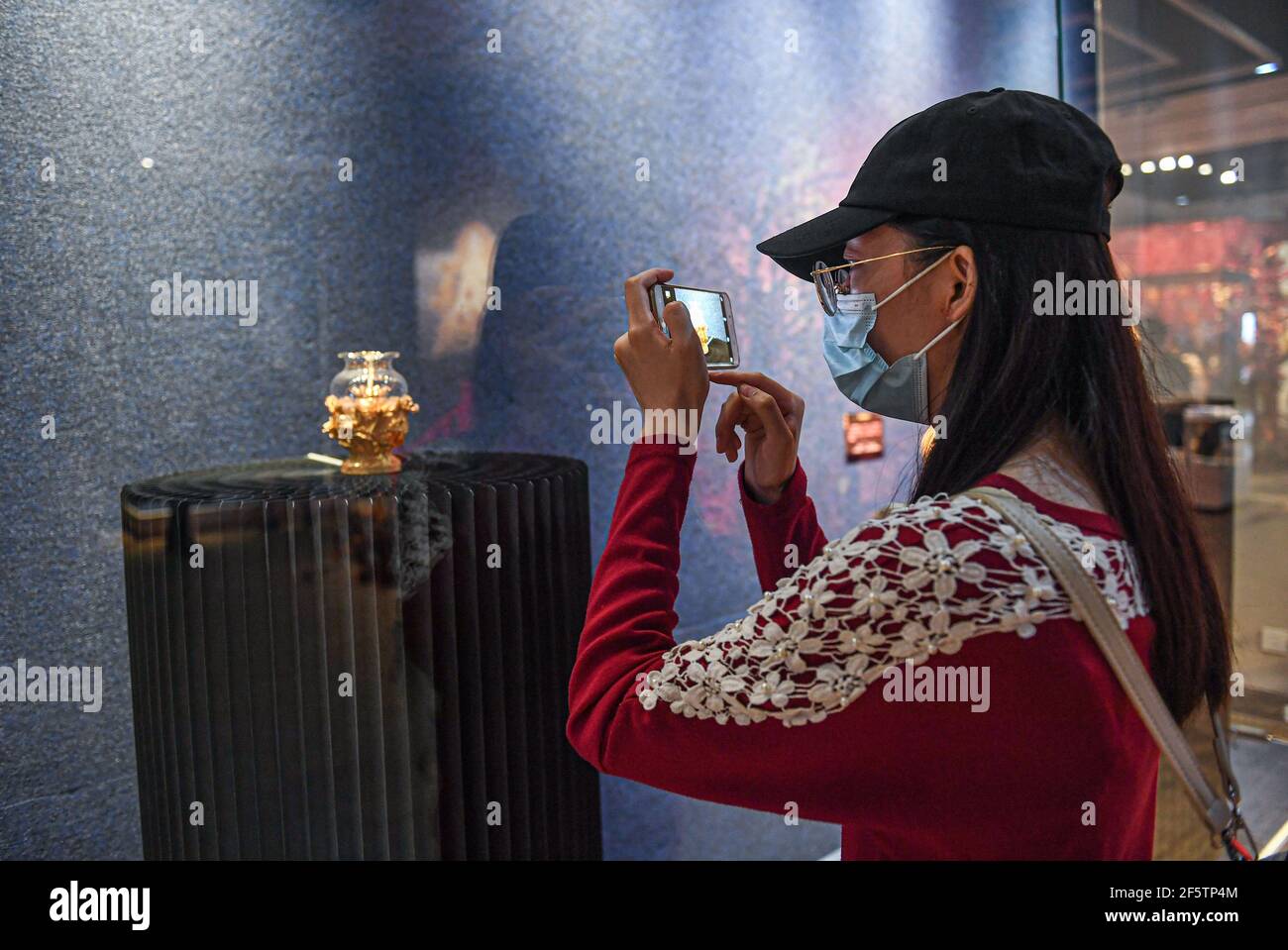 Haikou, China's Hainan Province. 28th Mar, 2021. People visit an art ...