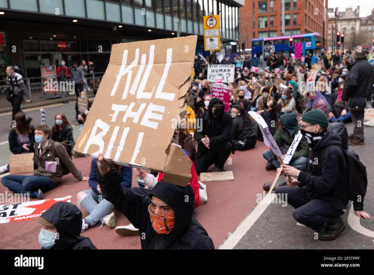 Manchester, UK. 27th March 2021. Protesters stage a sit-in protest at Portland street Manchester during a 'Kill The Bill' demonstration. The government's new legislation will give the police more powers to control protests. Picture: Gary Roberts Stock Photo