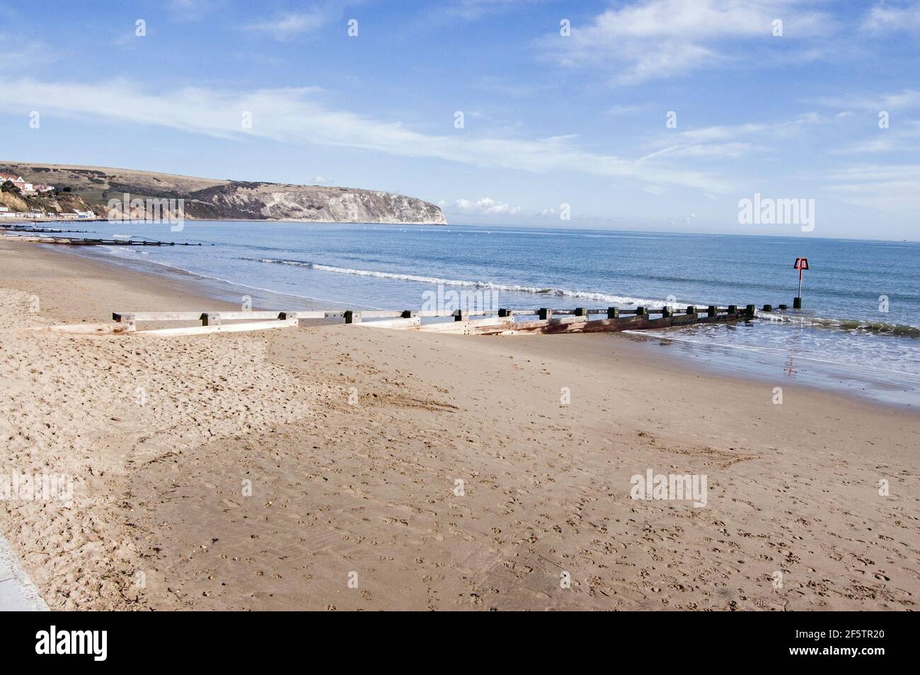 View along the sandy beach at the Dorset resort of Swanage. Stock Photo