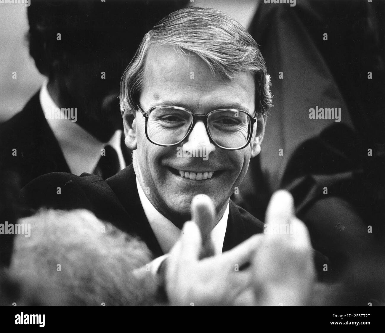 John Major shakes hands with supporters and public outside No10 Downing Street after his election victory today Stock Photo