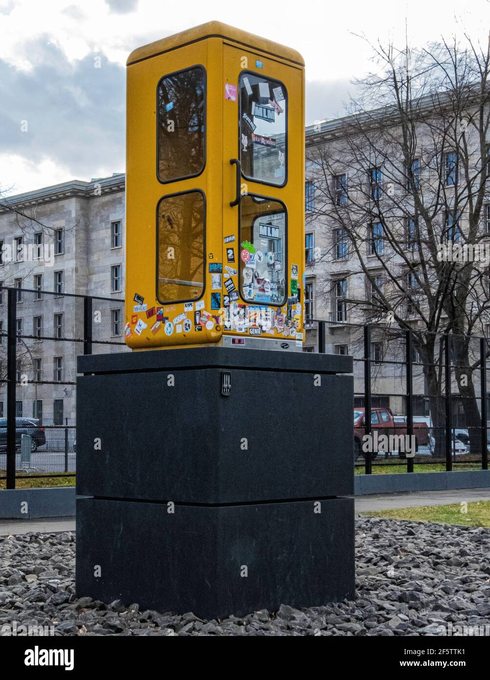 Old yellow phone box on black plinth at Berlin Phone Booth Memorial Park,  Communication & Post Office Museum, Leipzigerstrasse,Mitte,Berlin Stock  Photo - Alamy