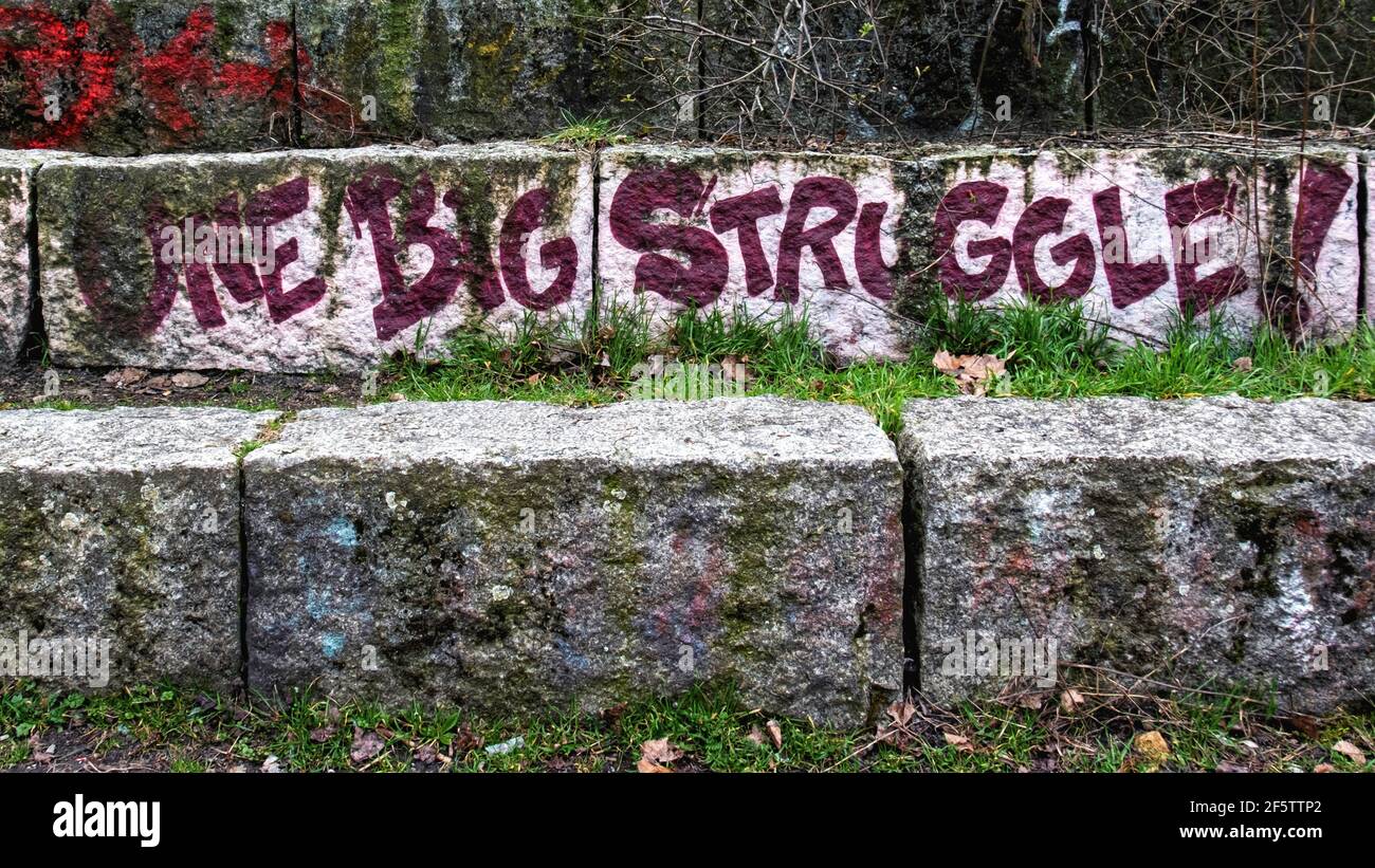 One big Struggle painted on stone in Mauerpark, Prenzlauer Berg,Berlin. Apt description for the 2020-2021 Covid Pandemic Stock Photo
