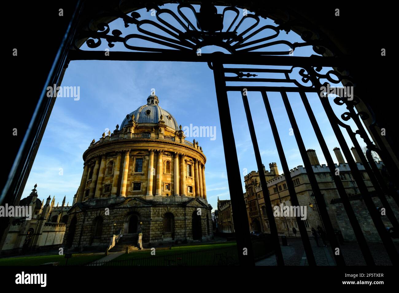 The Radcliffe Camera seen from the gates of the Bodleian Library, Oxford, UK Stock Photo
