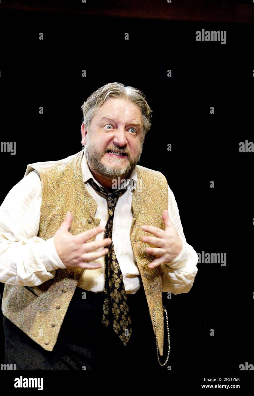 Simon Russell Beale (Vanya) in UNCLE VANYA by Chekhov at the Donmar Warehouse. London WC2  17/09/2002  in a new version by Brian Friel  design: Anthony Ward  lighting: Hugh Vanstone  director: Sam Mendes Stock Photo