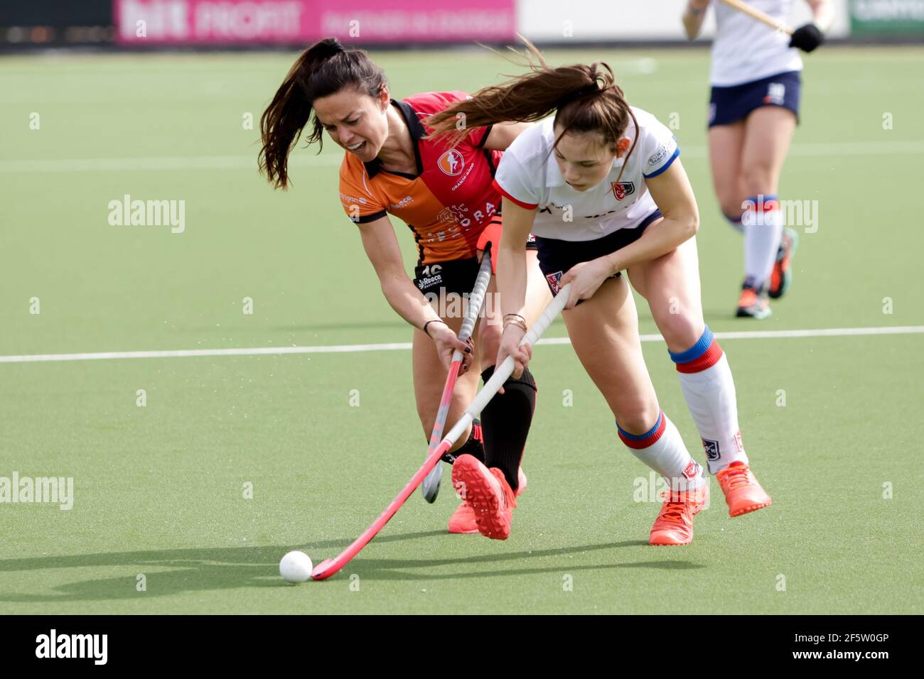 EINDHOVEN, NETHERLANDS - MARCH 28: Marlena Rybacha of Oranje Rood and Mare Agterberg of SCHC during the Women's Hoofdklasse Hockey - 2020/21 Season ma Stock Photo