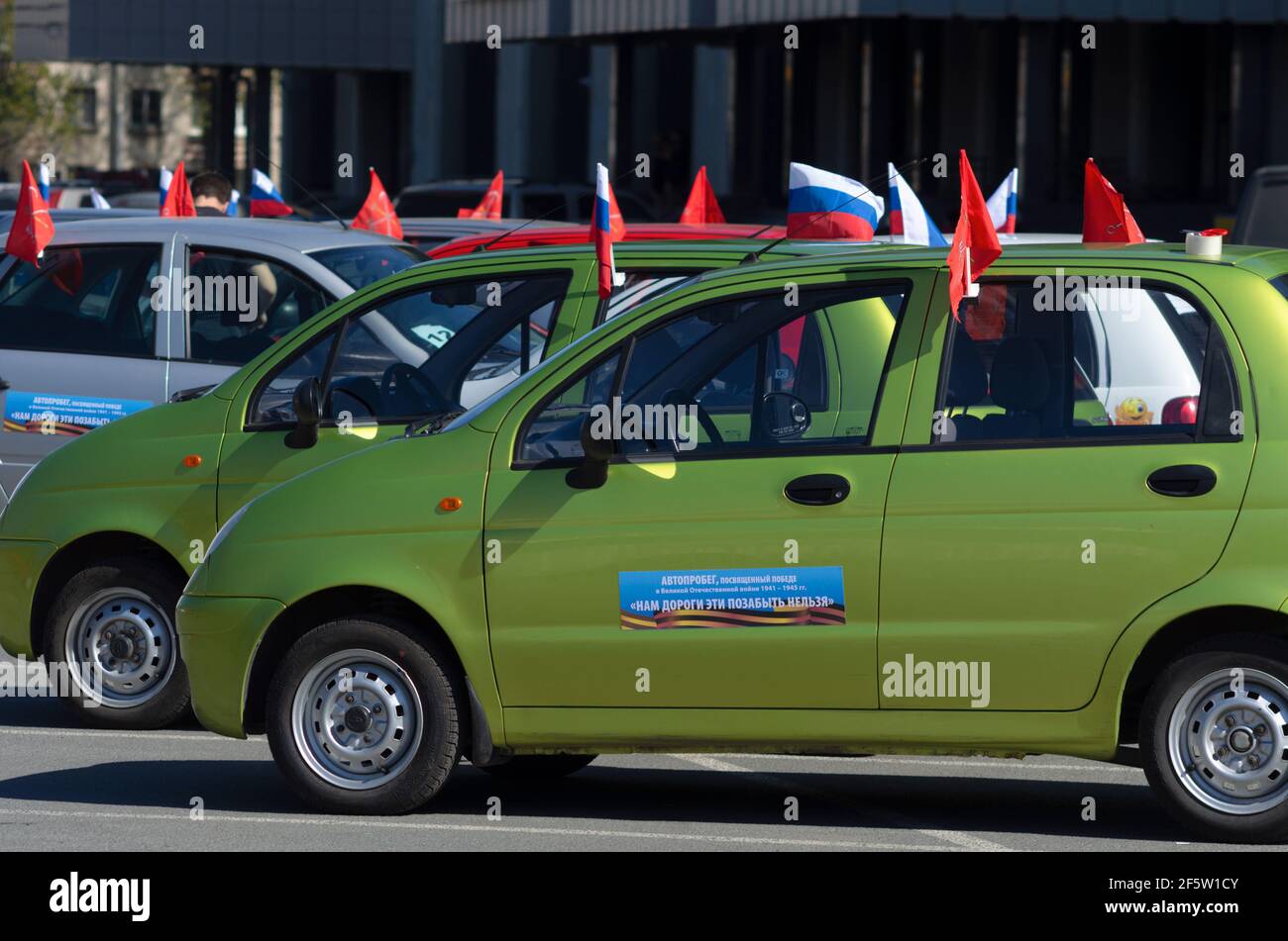 Saint Petersburg, Russia - May 05, 2016: Annual rally on flag-decorated small cars Daewoo Matiz in memory of the Great Patriotic War 1941-1945 Stock Photo