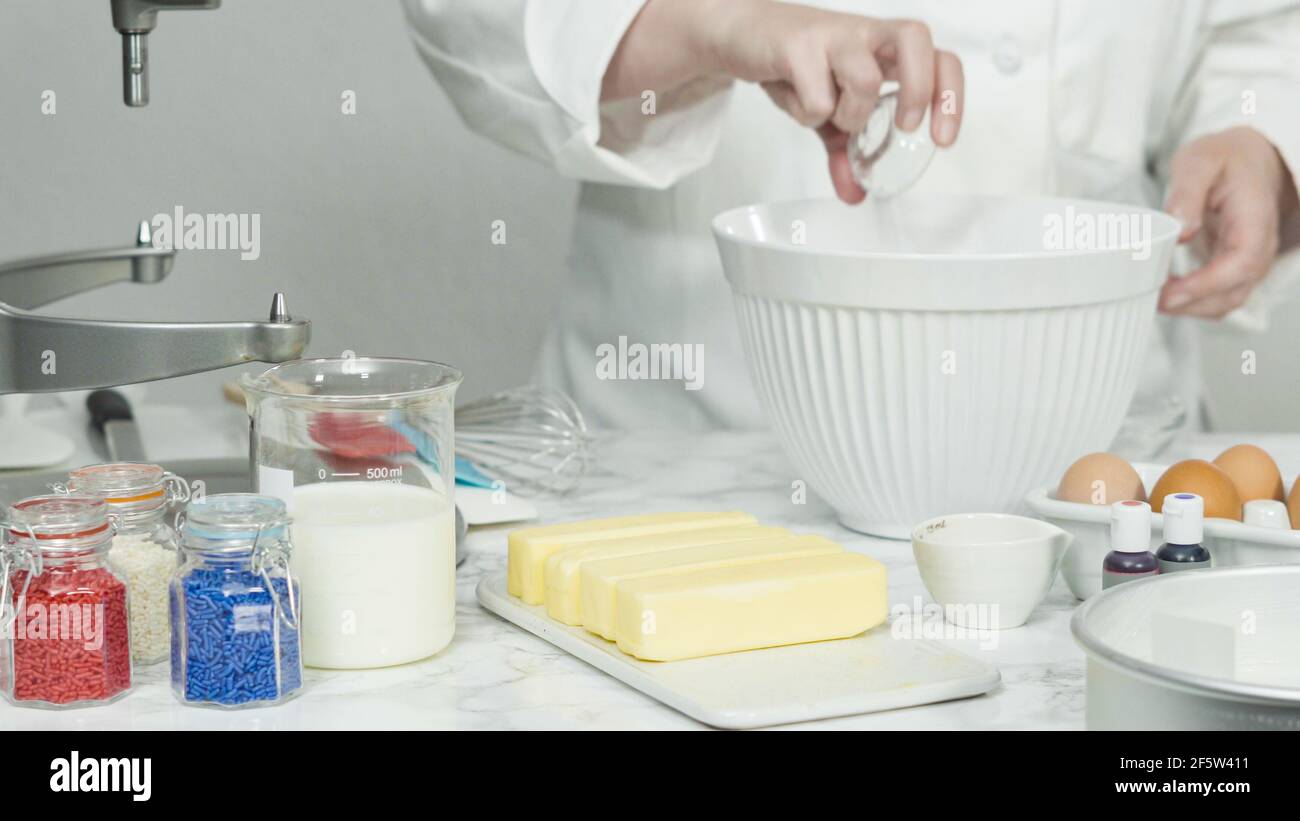 Step by step. Mixing ingredients in standing kitchen mixer to bake a
