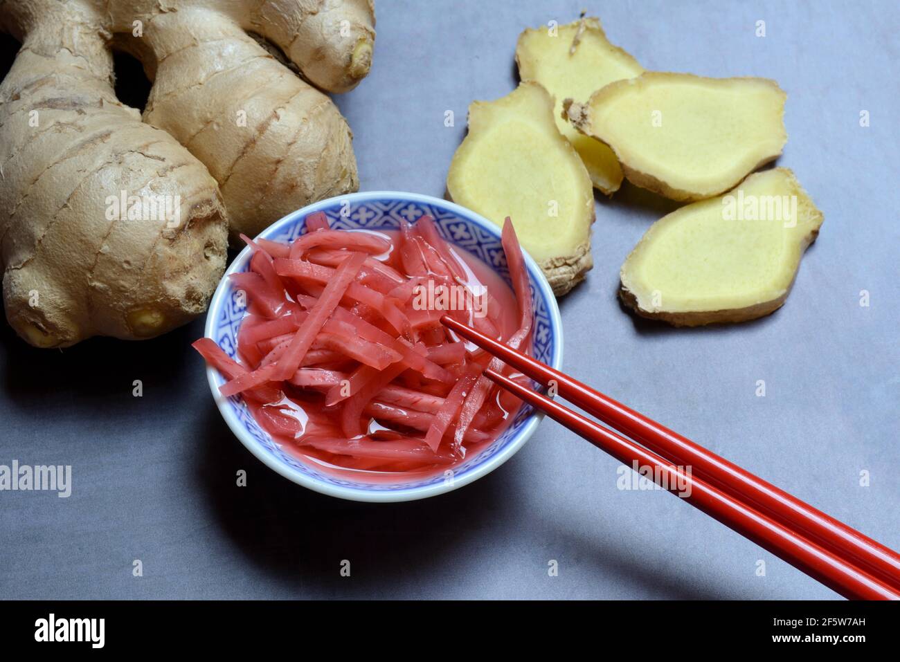 Pickled ginger in small bowls and ginger slices, ginger root, Germany