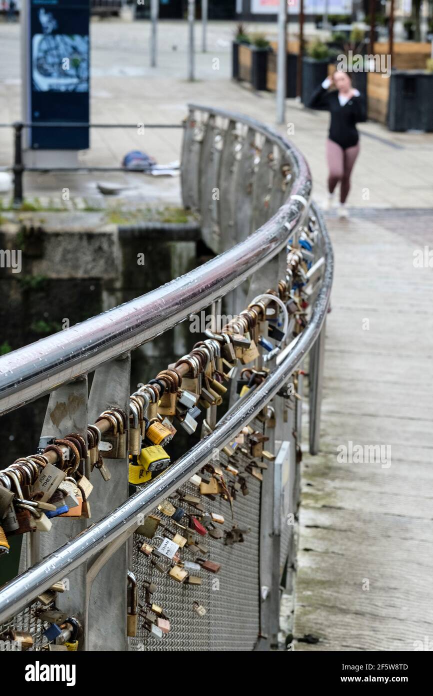 Love locks placed on Pero's bridge in Bristol city center. Sweethearts place locks on the bridge as momentos. Stock Photo