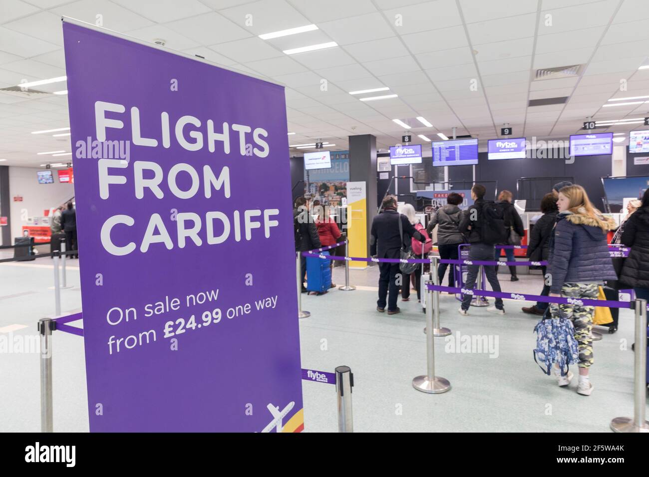 Flight ticket advertising, Cardiff airport, UK Stock Photo