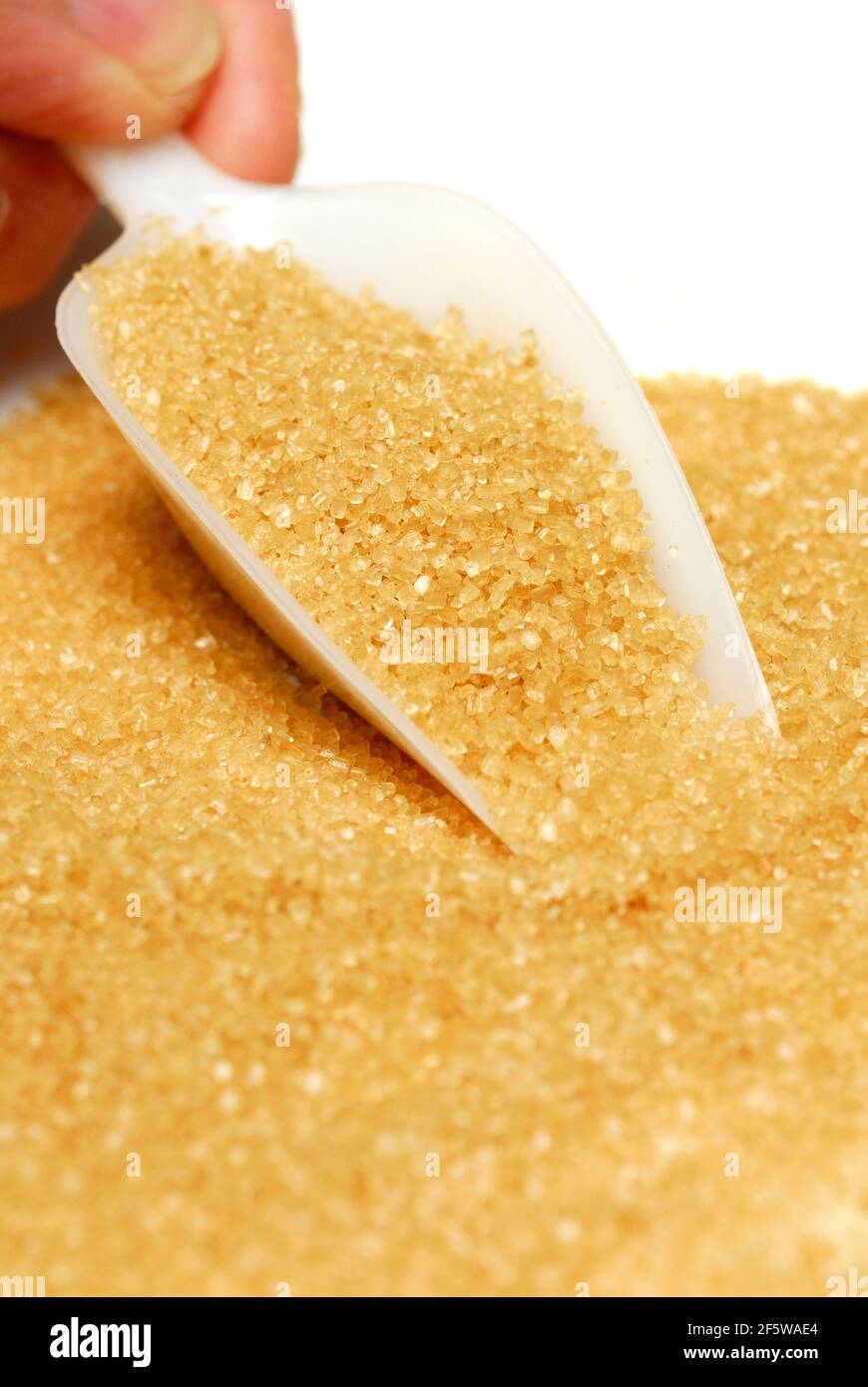 Brown sugar, beet sugar, cane sugar, sweet, sugar crystals, scoop Stock Photo Alamy