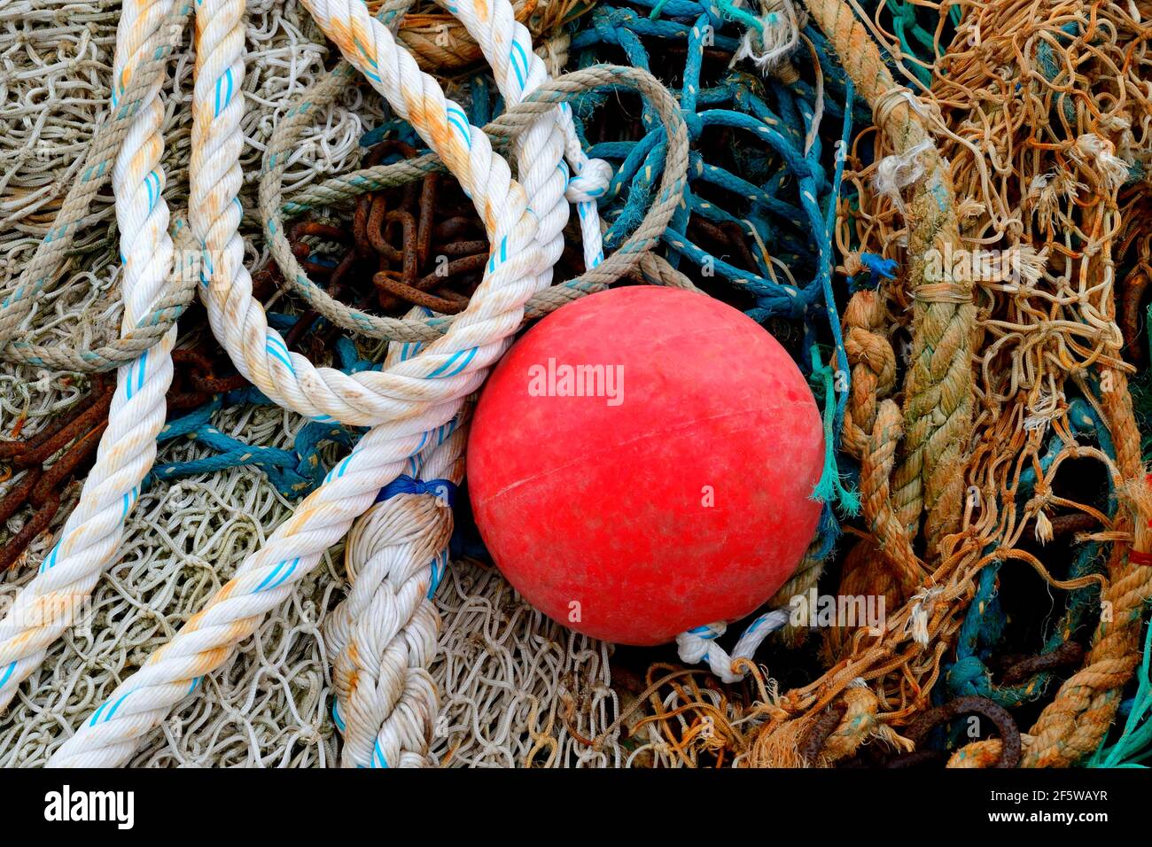 Ship ropes and fishing nets with floating ball, Honfleur, Normandy ...